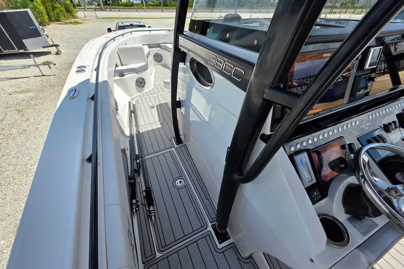 Slide: The Image of 2019 Fountain 38 Center Console boat interior with sleek design and advanced controls. - 16