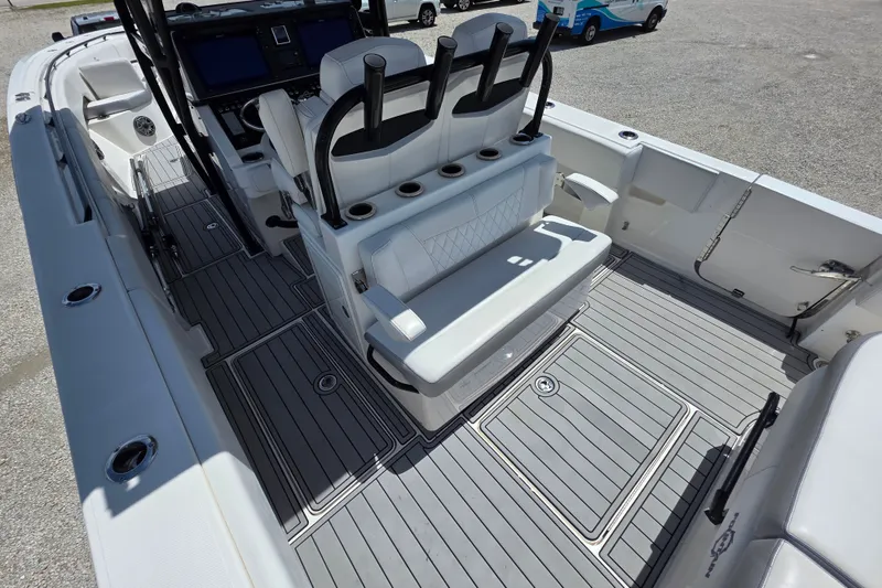 Slide: The Image of 2019 Fountain 38 Center Console boat interior with seating and control panel. - 15