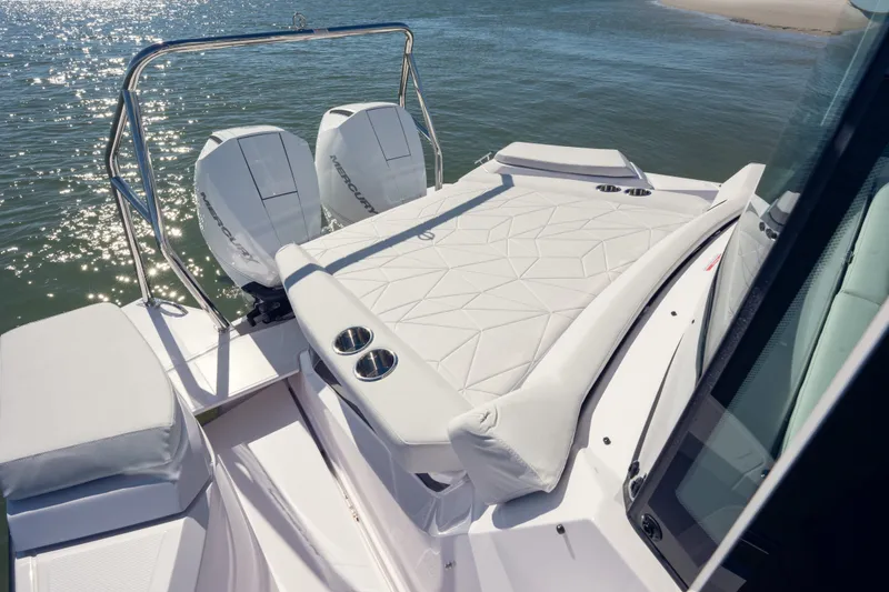 Slide: The Image of 2027 Axopar 29 XC Cross Cabin boat with dual Mercury engines and sun deck. - 8