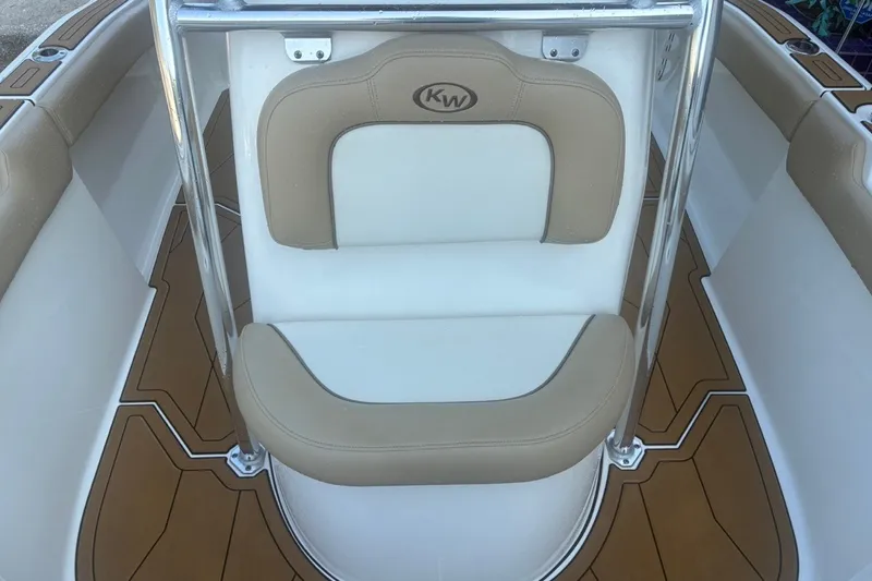 Slide: The Image of 2020 Key West 203 FS boat seat with tan and white upholstery. - 38