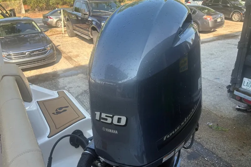 Slide: The Image of Yamaha 150 horsepower outboard motor on a 2020 Key West 203 FS boat. - 61