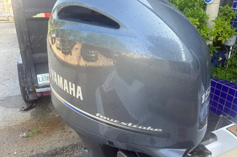 Slide: The Image of Yamaha 150 four-stroke outboard engine on a 2020 Key West 203 FS boat. - 60