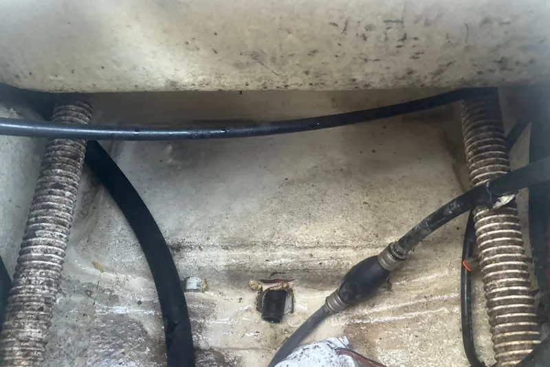 Slide: The Image of Boat wiring and cables in a 2020 Key West 203 FS, showing interior components. - 30