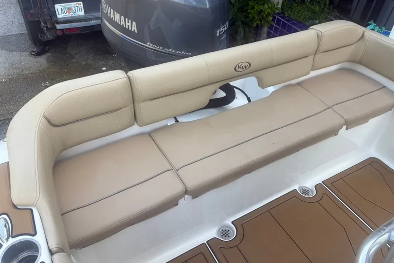 Slide: The Image of Beige seating on a 2020 Key West 203 FS boat with Yamaha engine. - 49