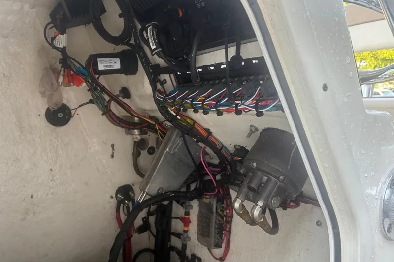 Slide: The Image of Wiring and components inside a 2020 Key West 203 FS boat console. - 37