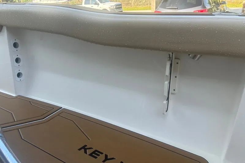 Slide: The Image of Interior view of a 2020 Key West 203 FS boat, featuring deck details and fittings. - 58