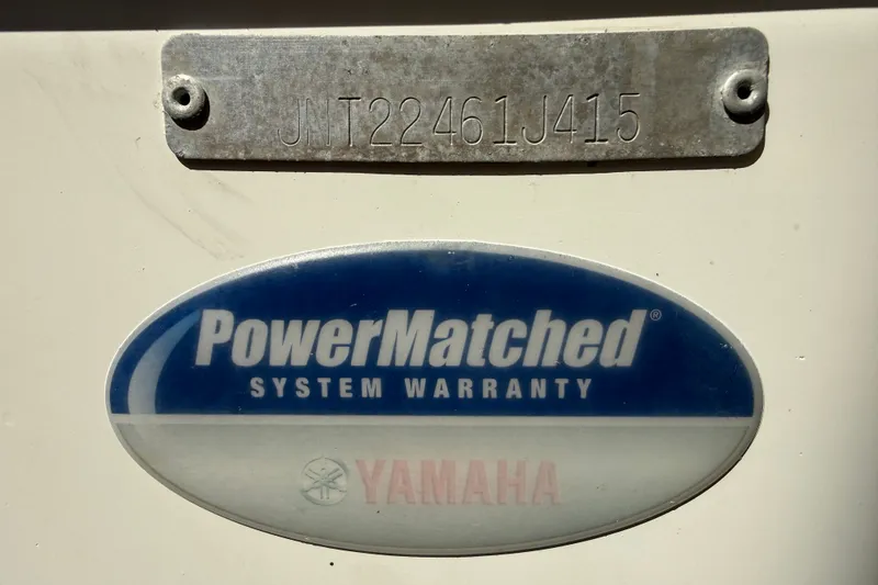 Slide: The Image of 2015 NauticStar 2500XS Offshore boat with PowerMatched Yamaha system warranty label. - 54