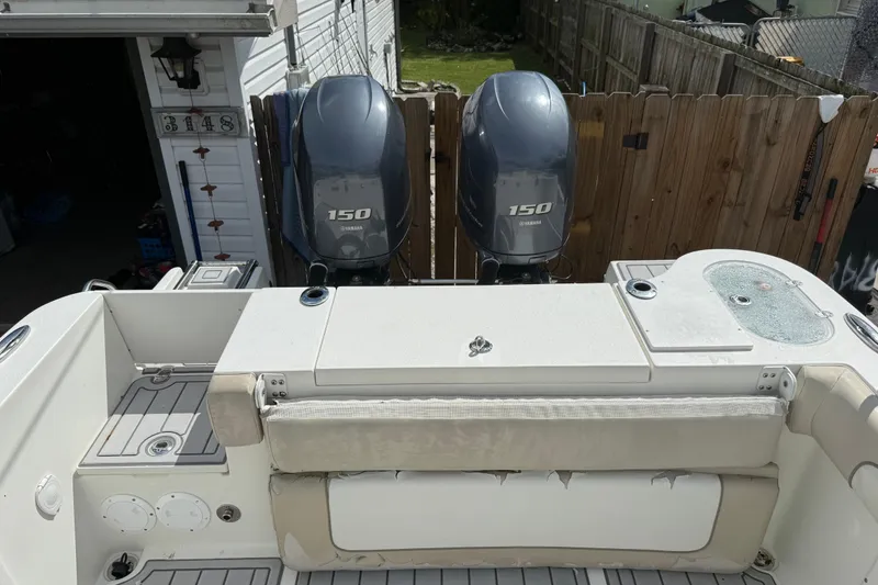 Slide: The Image of 2015 NauticStar 2500XS Offshore boat with twin Yamaha 150 engines. - 46