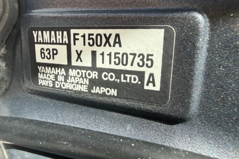 Slide: The Image of Yamaha F150XA engine label on 2015 NauticStar 2500XS Offshore boat, made in Japan. - 53