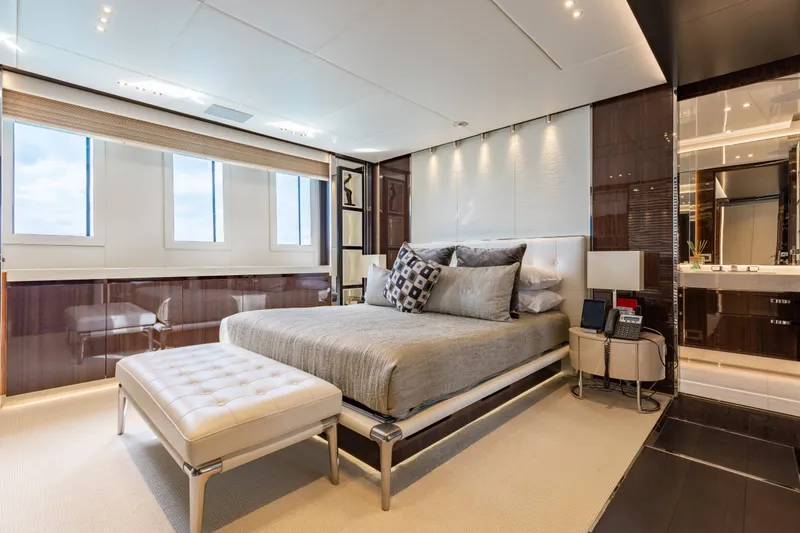 Slide: The Image of Luxurious bedroom interior of a 2016 Benetti Motoryacht with modern decor and elegant furnishings. - 24