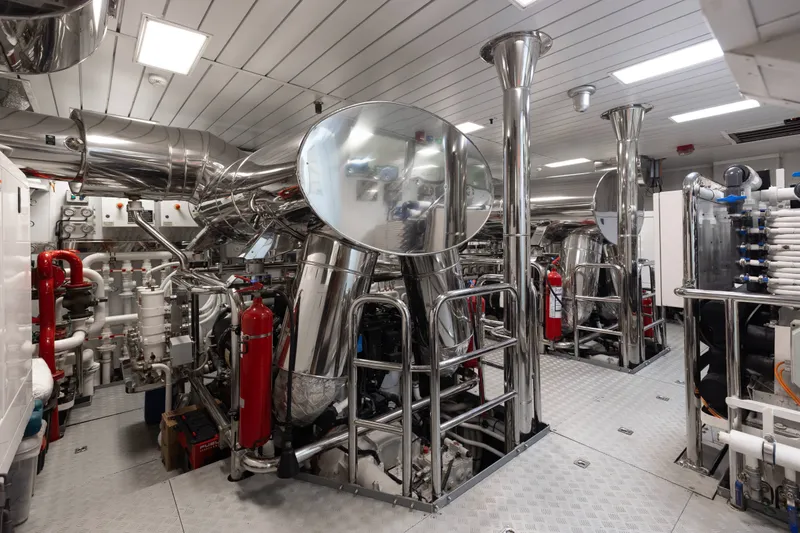 Slide: The Image of Engine room of a 2016 Benetti Motoryacht with polished metal components and equipment. - 41