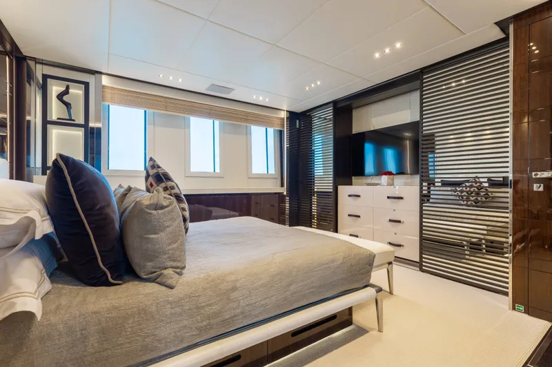 Slide: The Image of Luxurious bedroom interior of a 2016 Benetti Motoryacht with modern decor and elegant furnishings. - 28
