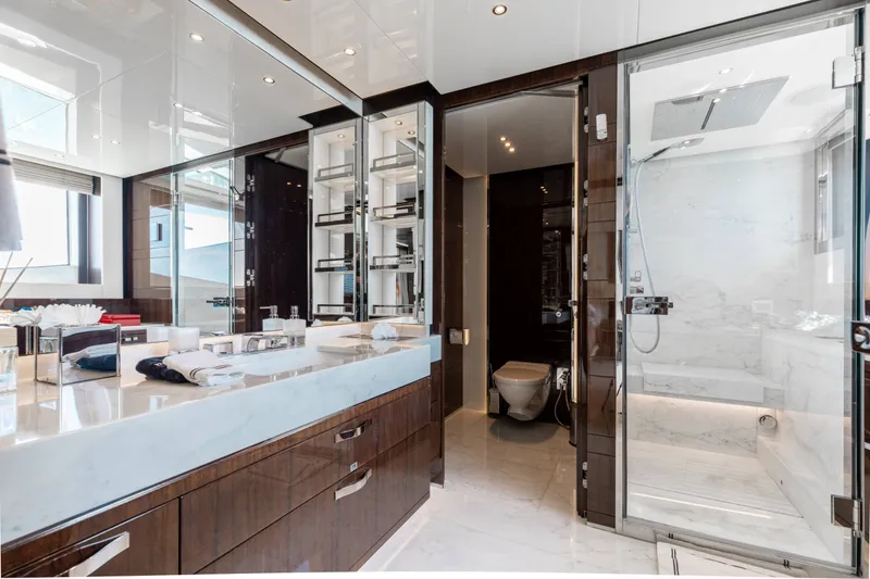 Slide: The Image of Luxurious bathroom on a 2016 Benetti Motoryacht with marble and wood finishes. - 16