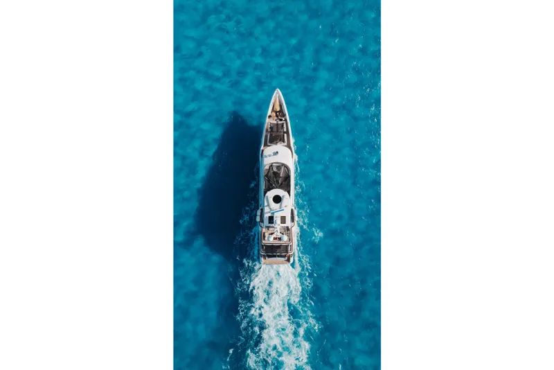 Slide: The Image of Aerial view of 2016 Benetti Motoryacht cruising in clear blue waters. - 66