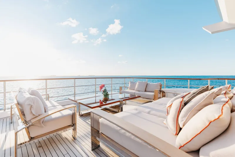 Slide: The Image of Luxurious 2016 Benetti Motoryacht deck with elegant seating and ocean view. - 51