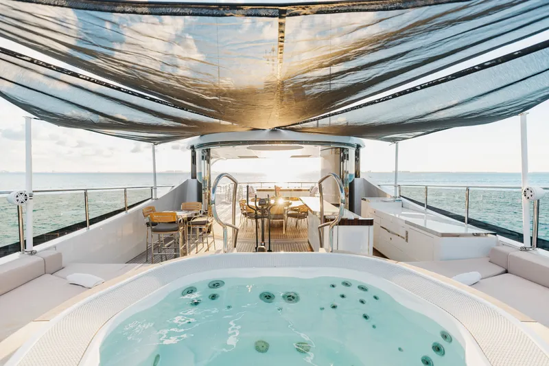 Slide: The Image of Luxurious 2016 Benetti Motoryacht deck with jacuzzi and ocean view. - 56