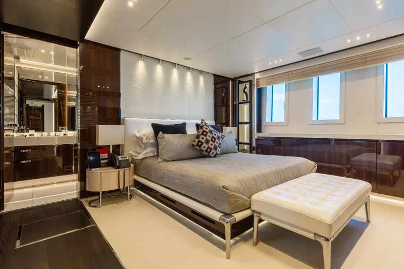 Slide: The Image of Luxurious bedroom interior on a 2016 Benetti Motoryacht with modern decor and elegant furnishings. - 27