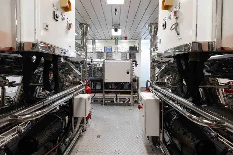 Slide: The Image of Engine room of a 2016 Benetti Motoryacht, featuring advanced machinery and control panels. - 40