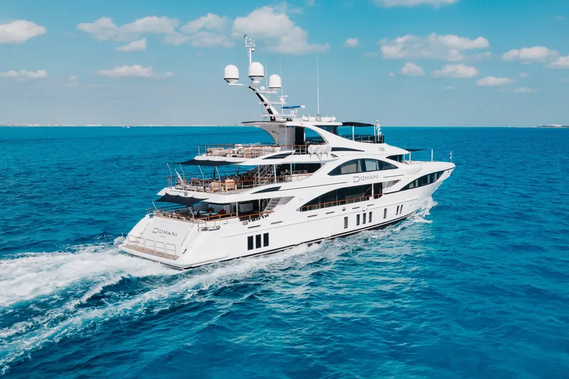Slide: The Image of Luxurious 2016 Benetti Motoryacht cruising on clear blue ocean waters. - 64