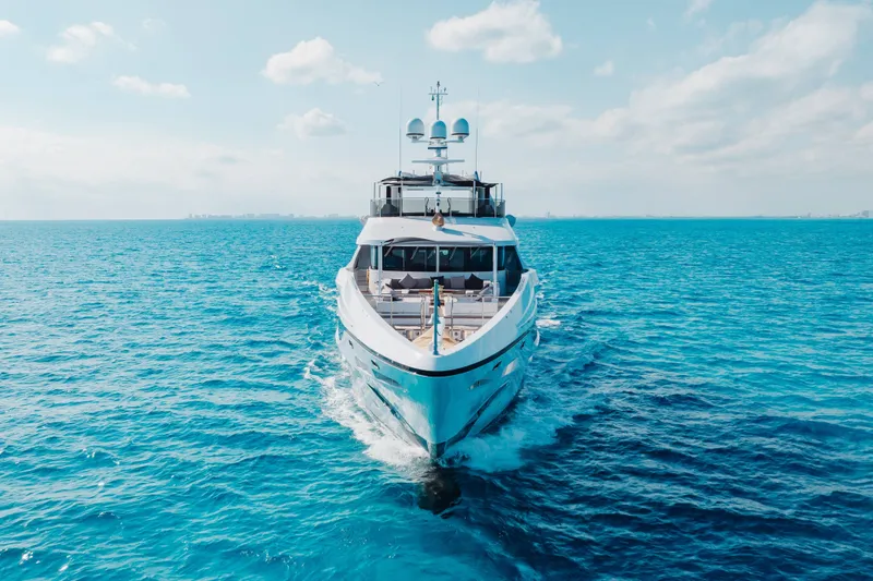 Slide: The Image of Luxurious 2016 Benetti Motoryacht cruising on clear blue ocean waters. - 67