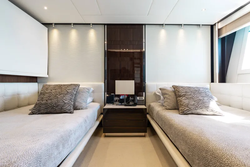 Slide: The Image of Luxurious twin bedroom on a 2016 Benetti Motoryacht, featuring elegant decor and modern amenities. - 33