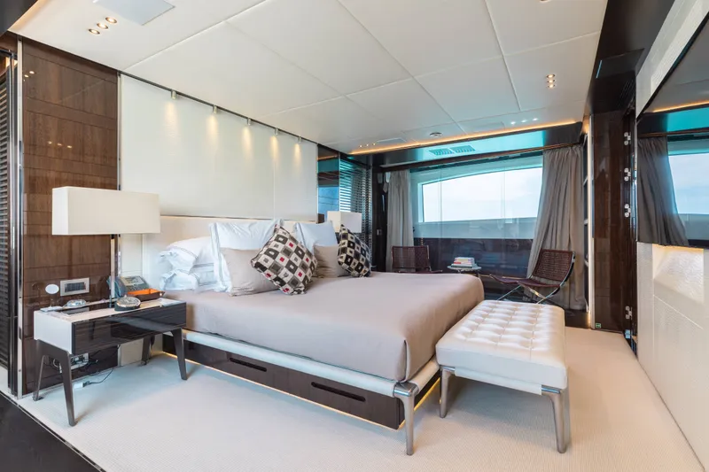 Slide: The Image of Luxurious bedroom interior on a 2016 Benetti Motoryacht, featuring modern design and elegant furnishings. - 11