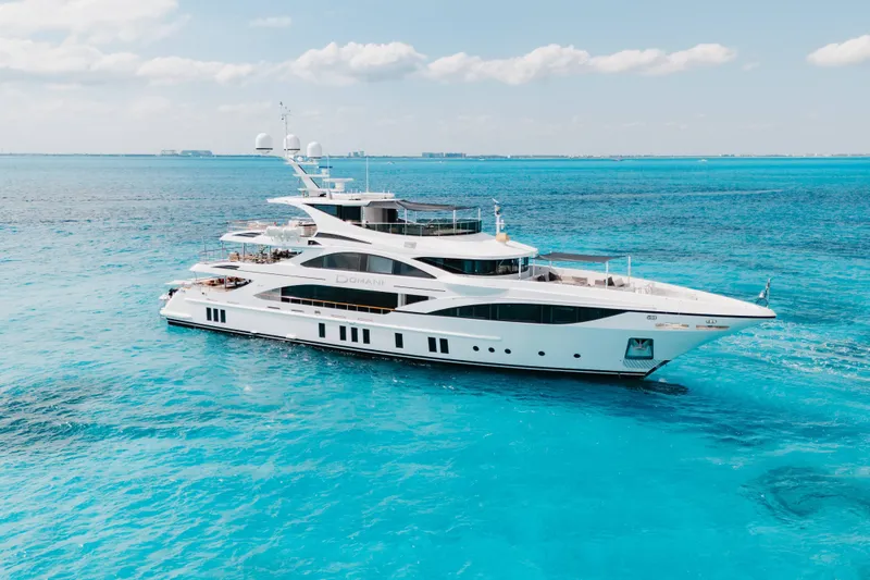 Slide: The Image of Luxurious 2016 Benetti Motoryacht cruising in clear blue ocean waters. - 2