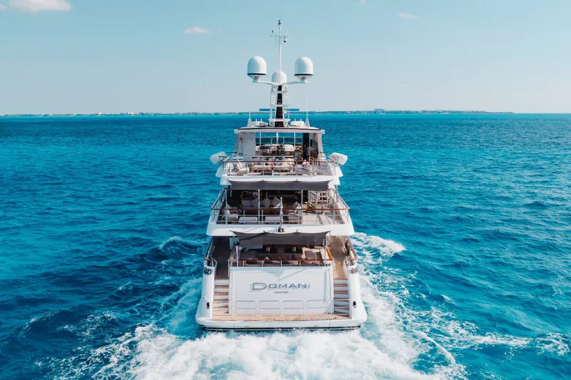 Slide: The Image of Luxurious 2016 Benetti Motoryacht cruising on clear blue ocean waters. - 65