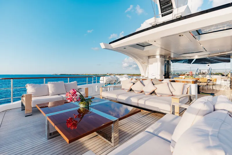 Slide: The Image of Luxurious 2016 Benetti Motoryacht deck with elegant seating and ocean view. - 52