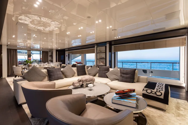 Slide: The Image of Luxurious 2016 Benetti Motoryacht interior with elegant seating and ocean view. - 5