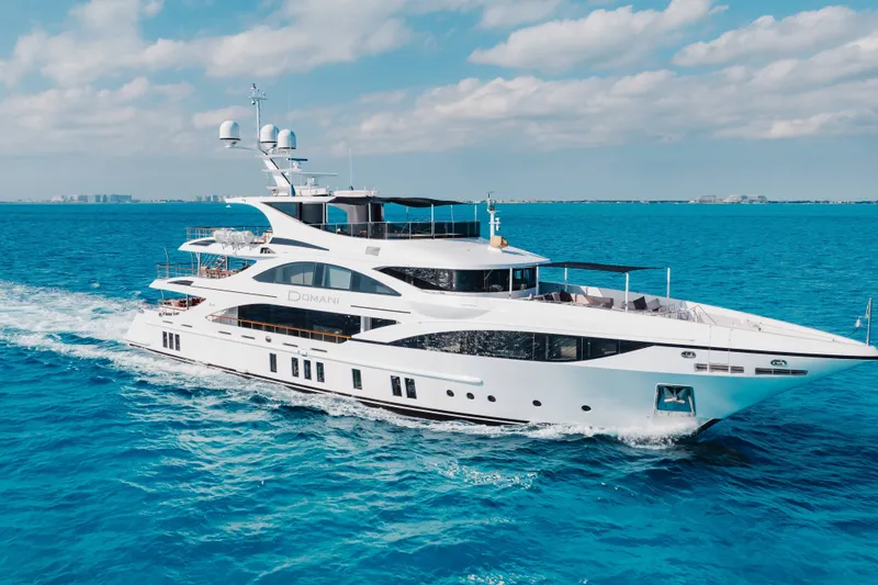 Slide: The Image of Luxurious 2016 Benetti Motoryacht cruising on clear blue ocean waters. - 68