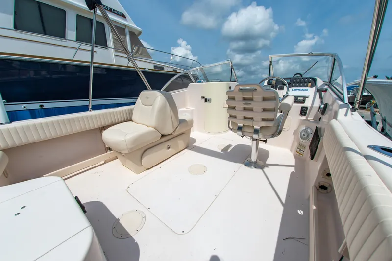 Slide: The Image of 2007 Grady-White Tournament 205 boat interior with seating and control panel. - 9