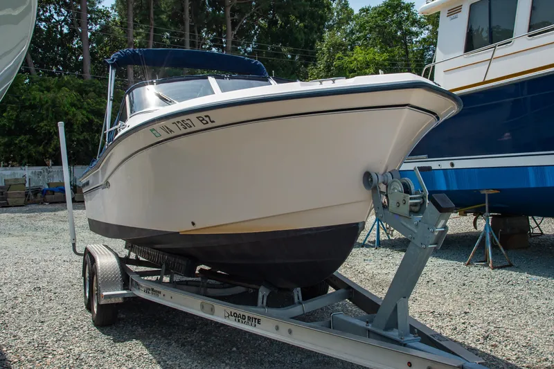 Slide: The Image of 2007 Grady-White Tournament 205 boat on trailer in outdoor storage area. - 13