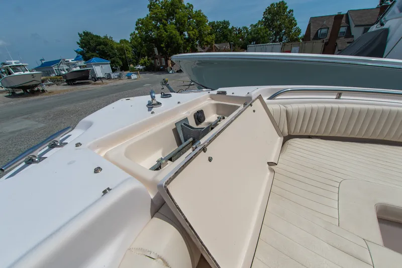 Slide: The Image of 2007 Grady-White Tournament 205 boat interior with open storage compartment. - 7