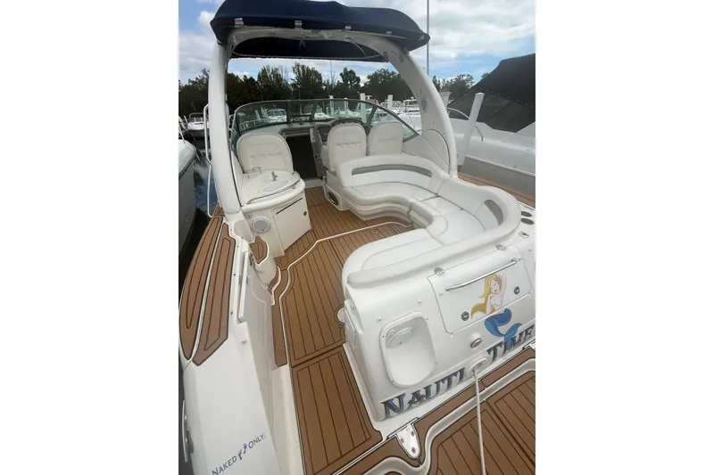 Slide: The Image of 2007 Sea Ray 340 Sundancer boat with spacious seating and teak deck. - 17