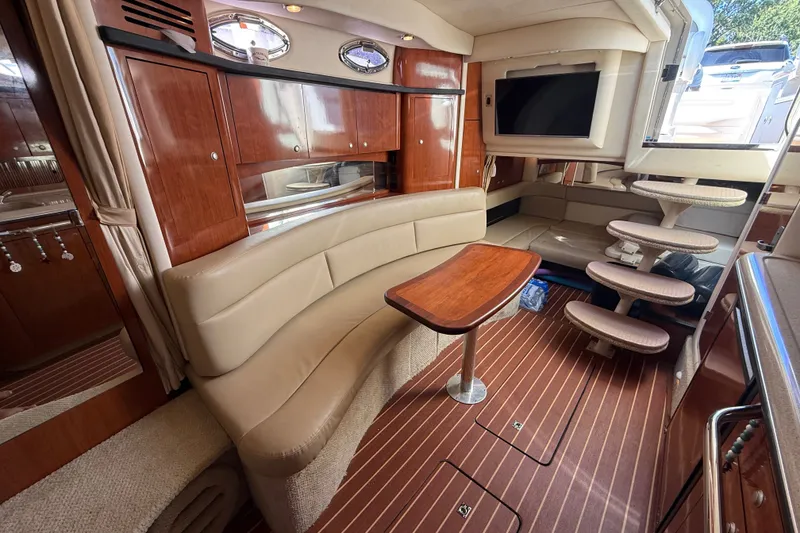 Slide: The Image of Luxurious interior of a 2007 Sea Ray 340 Sundancer yacht with elegant wood finishes. - 36