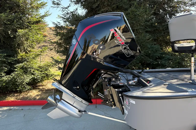 Slide: The Image of 2027 Tracker Savage 215 boat with Mercury Pro XS outboard motor. - 14