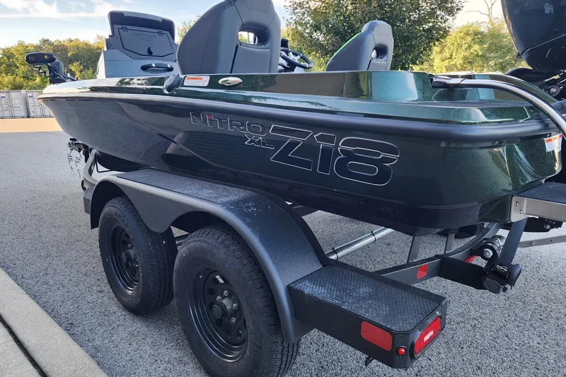 Slide: The Image of 2027 Nitro Z18 XL Pro boat on trailer, parked outdoors. - 3