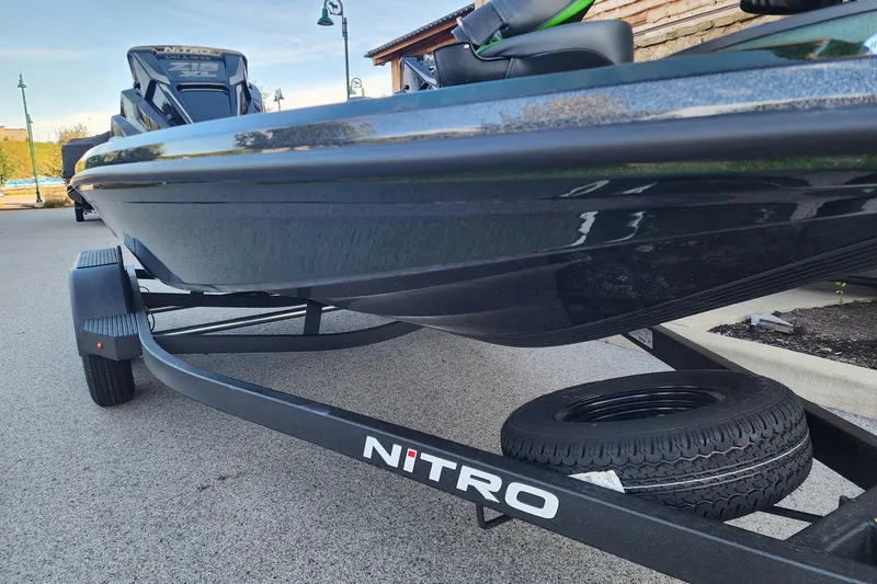 Slide: The Image of 2027 Nitro Z18 XL Pro boat on trailer, close-up view. - 62