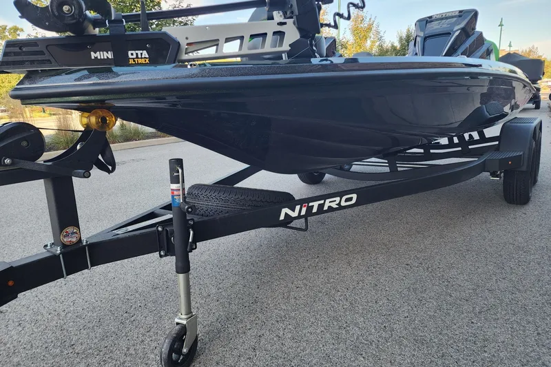 Slide: The Image of 2027 Nitro Z18 XL Pro boat on trailer, featuring Minn Kota Ultrex motor. - 2