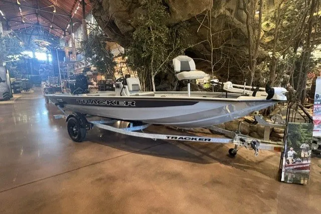 The Image of 2027 Tracker Bass Tracker 175 CC boat displayed indoors on a trailer. - 0