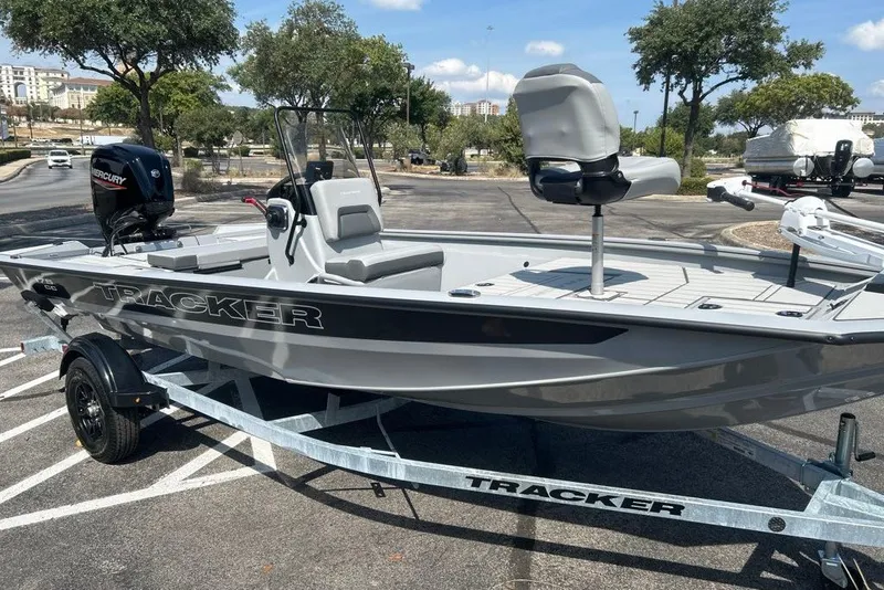 The Image of 2027 Tracker Bass Tracker 175 CC boat on trailer in parking lot. - 0