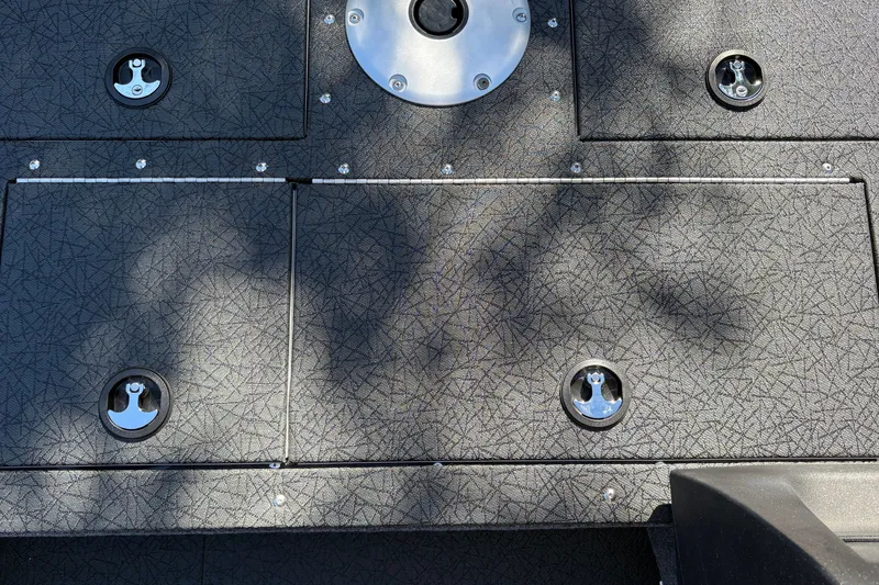 Slide: The Image of Deck of 2027 Tracker Pro Guide V-16 SC boat with storage compartments. - 40