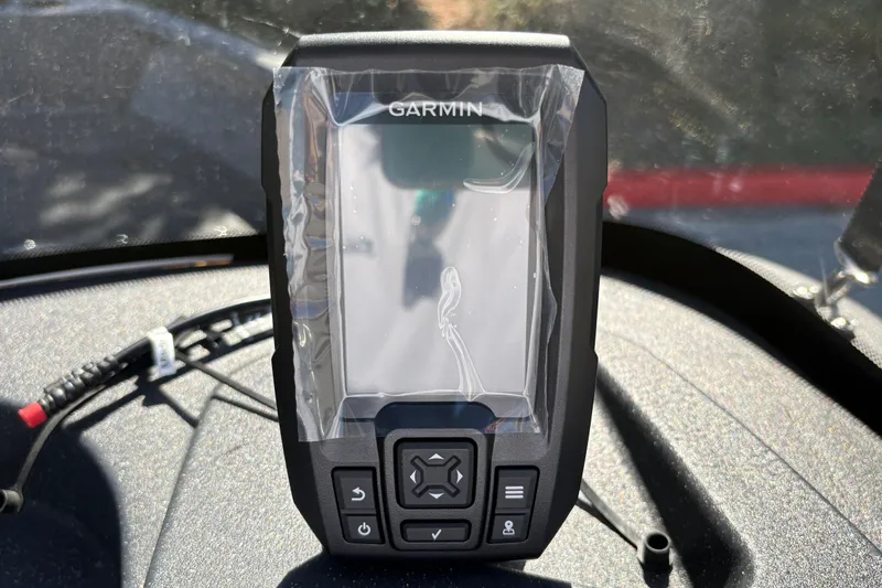 Slide: The Image of Garmin device on 2027 Tracker Pro Guide V-16 SC dashboard, sunlight reflection. - 21