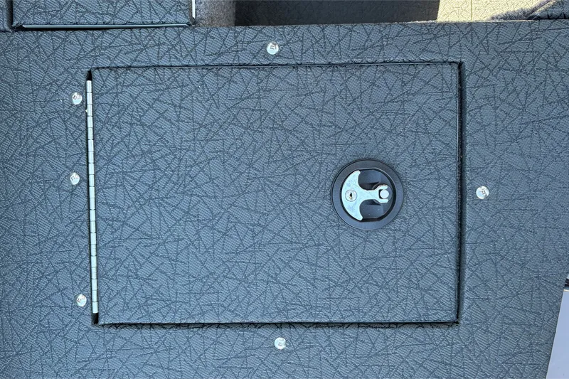 Slide: The Image of 2027 Tracker Pro Guide V-16 SC boat hatch with textured surface and secure latch. - 30