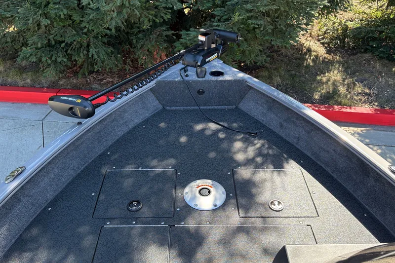 Slide: The Image of 2027 Tracker Pro Guide V-16 SC boat deck with Minn Kota trolling motor. - 22