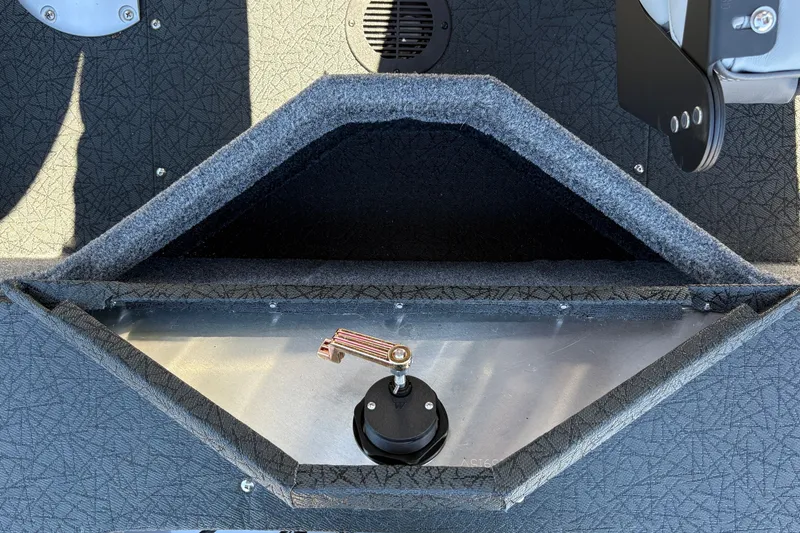Slide: The Image of Interior view of 2027 Tracker Pro Guide V-16 SC boat compartment with textured finish. - 25