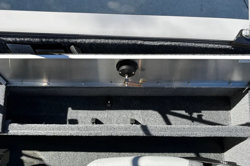 Slide: The Image of Interior view of 2027 Tracker Pro Guide V-16 SC boat storage compartment. - 33