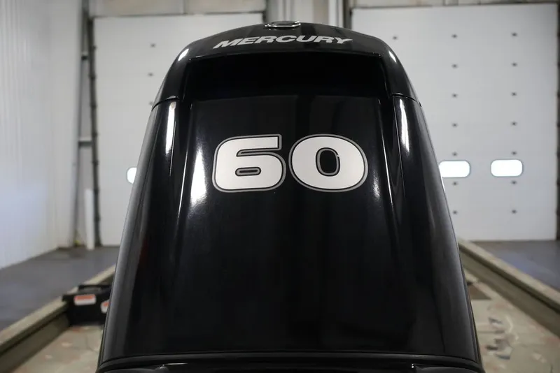 Slide: The Image of Mercury 60 horsepower outboard motor on 2024 Tracker Grizzly 1860 MVX CC boat. - 29