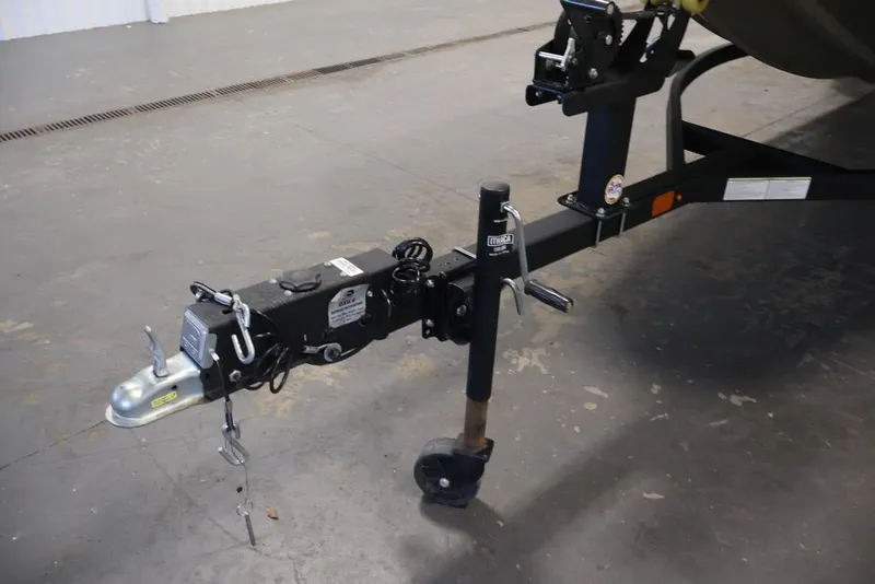 Slide: The Image of Trailer hitch of 2024 Tracker Grizzly 1860 MVX CC boat on concrete floor. - 36
